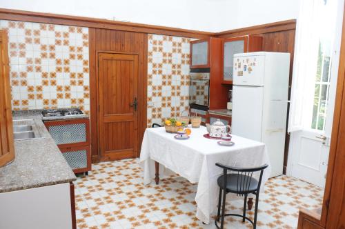 Kuchyň nebo kuchyňský kout v ubytování La Serra - Villa De Bonis