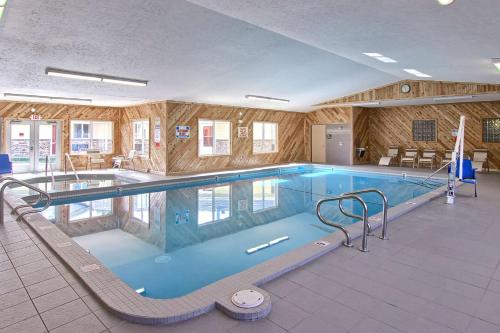 a large swimming pool in a building at Best Western of Harbor Springs in Harbor Springs