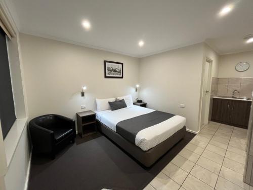 Posteľ alebo postele v izbe v ubytovaní Ryley Motor Inn