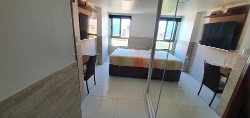 Postel nebo postele na pokoji v ubytování Luxor Tambaú AP 100 metros da praia com vista para o mar