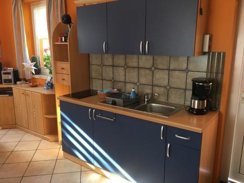 Kuchyň nebo kuchyňský kout v ubytování Ferienhaus mit Terrasse - Insel Usedom