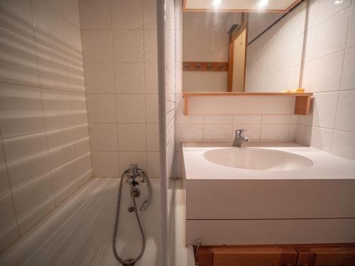 a bathroom with a sink and a shower at Appartement Valmorel, 1 pièce, 4 personnes - FR-1-356-254 in Valmorel