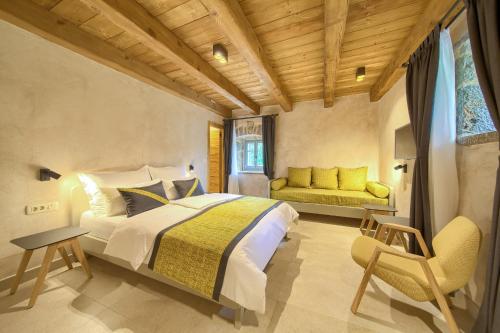 A bed or beds in a room at Luxury Jerini Estate