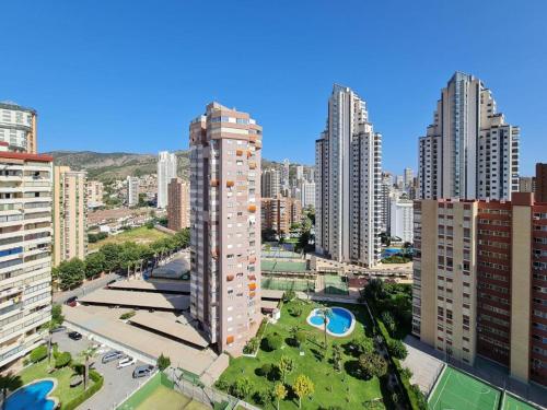 an aerial view of a city with tall buildings at Apartamento Completo Torresol IV in Benidorm