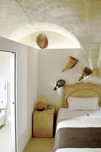 Il Claustro - Bed and breakfastにあるベッド