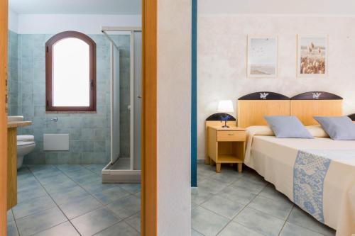 Koupelna v ubytování Hotel Villa del Mare Solanas