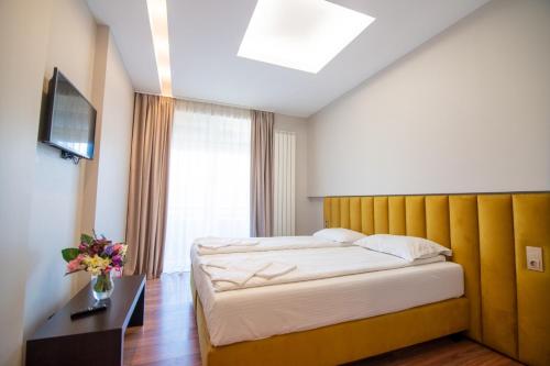 Postel nebo postele na pokoji v ubytování HOTEL VITAL