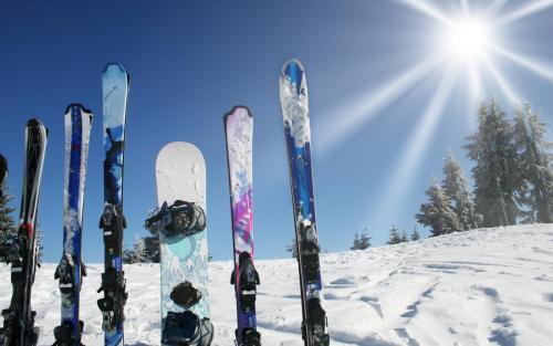 a group of skis standing in the snow at Malskaya Dolina in Rogovo