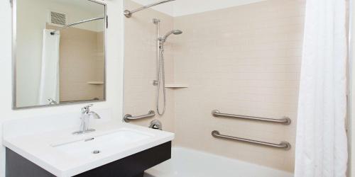 a bathroom with a sink and a shower at Sonesta Simply Suites Philadelphia Mount Laurel in Mount Laurel