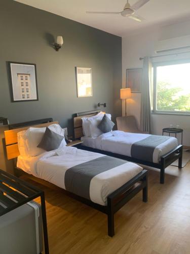 Postel nebo postele na pokoji v ubytování Loft 24, Mansarovar