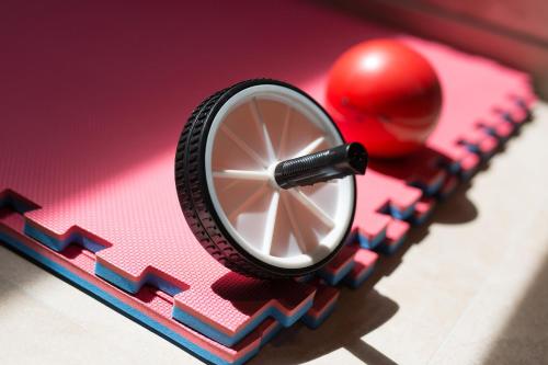 a red toy car with a wheel and a pen at Luxury Jerini House with pool and wellness in Bajčići