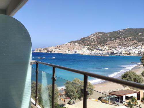 a view of the beach from a balcony at Konstantinos Palace in Karpathos Town