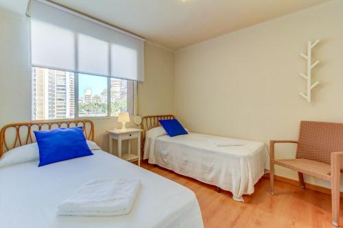 Postel nebo postele na pokoji v ubytování Ranchos Apartment