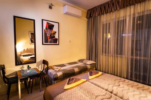 Ένα ή περισσότερα κρεβάτια σε δωμάτιο στο Residence Art Guest House