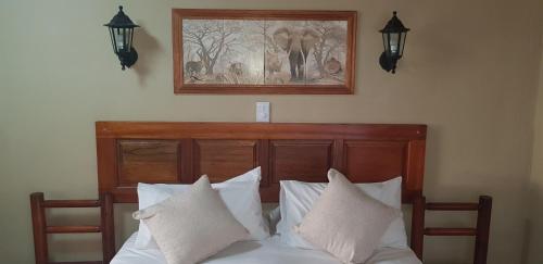 Ένα ή περισσότερα κρεβάτια σε δωμάτιο στο Lani's Guest House - No Loadshedding
