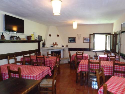 Reštaurácia alebo iné gastronomické zariadenie v ubytovaní Agriturismo Le Prata