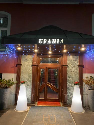 a front door of a hotel with lights on it at Hotel Urania in Vienna
