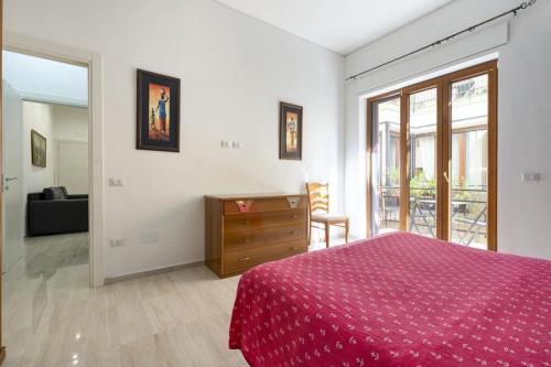 Il Cavaluccio Marino House tesisinde bir odada yatak veya yataklar