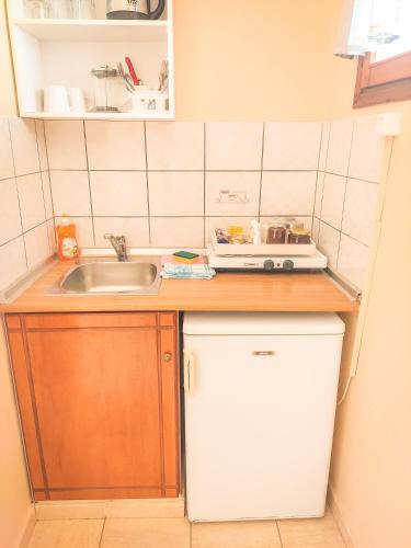 Dapur atau dapur kecil di Celeste Golden Beach
