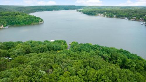 an aerial view of a large river with trees at Private Dock Spacious Lakefront Home in Stover in Laurie