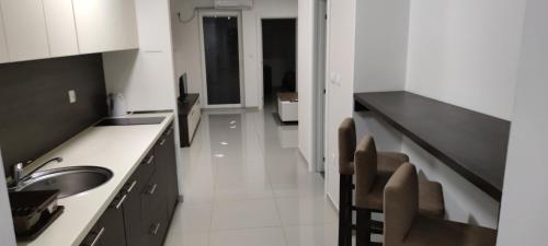 Η κουζίνα ή μικρή κουζίνα στο Panorama apartments
