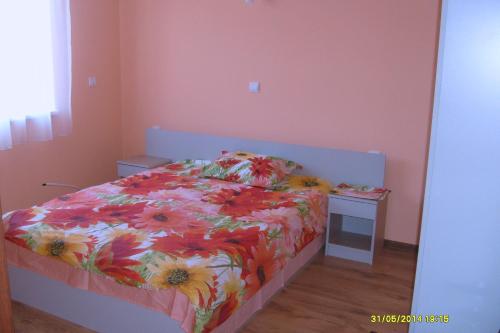Ένα ή περισσότερα κρεβάτια σε δωμάτιο στο Guest Rooms Mihaylovi