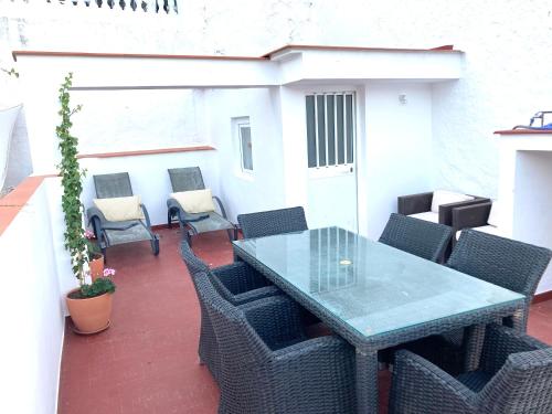 Posezení v ubytování Puerta de la Villa Apartamento