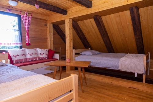 Posteľ alebo postele v izbe v ubytovaní FoRest Chalet