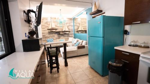Una cocina o zona de cocina en Villas Aqua Los Cabos