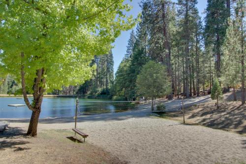 a park with a bench next to a lake at Worth The Waite in Arnold