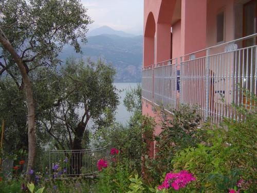 a balcony of a building with a view of a lake at Hotel Residence Panoramica in Brenzone sul Garda