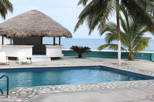 Bazén v ubytování Beachside apartment with 2 pools, Same, Esmeraldas nebo v jeho okolí