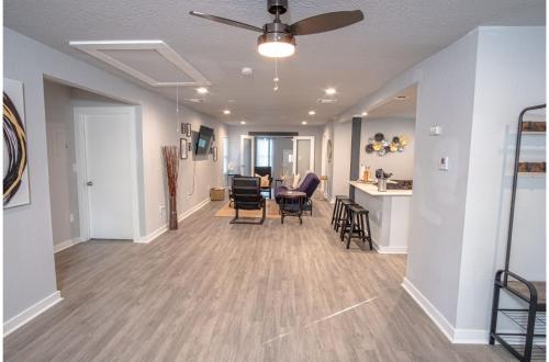 a hallway of a home with a living room and a kitchen at Stylish 4 Br2Ba Renovated Home Near Downtown in San Antonio