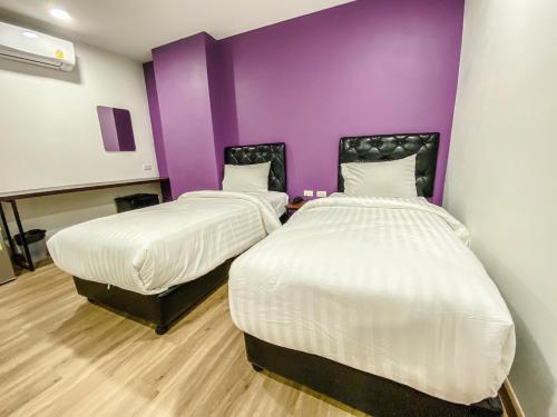 Ένα ή περισσότερα κρεβάτια σε δωμάτιο στο K2Green Hotel