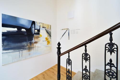 a picture of a car in a museum exhibit at Kalina Apartments in Brno