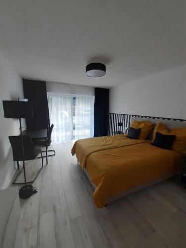 Łóżko lub łóżka w pokoju w obiekcie Apartment Kampenwand
