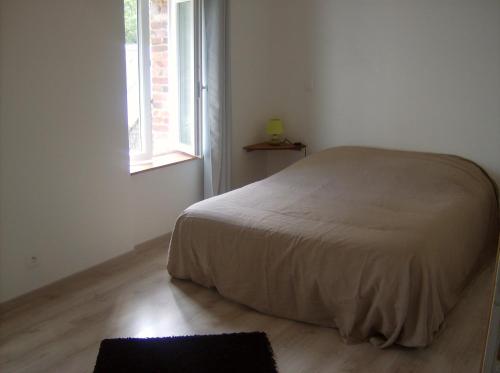 Postel nebo postele na pokoji v ubytování Gîte des Forges