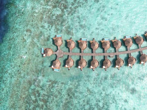 an aerial view of a resort in the water at Mercure Maldives Kooddoo - Adults - Only Escape - 50 percent off Transfers in Gaafu Alifu Atoll