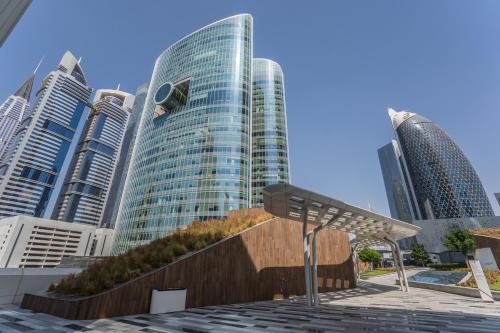 a view of a city skyline with tall buildings at HiGuests - Luxury Apartment in the Iconic Park Towers in Dubai