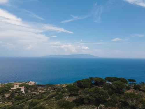 an island in the middle of the ocean at Hotel Castello Monticello in Giglio Porto