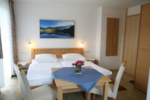 Postel nebo postele na pokoji v ubytování Apartmenthaus Dornröschen