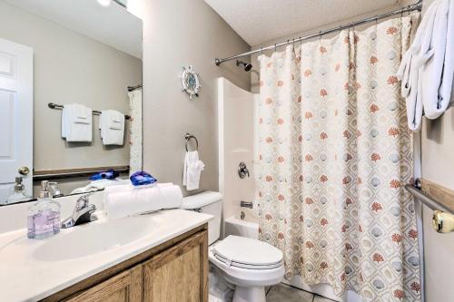 a bathroom with a sink and a toilet and a shower at Orange Beach Home with Hot Tub Less Than 2 Mi to The Wharf in Orange Beach