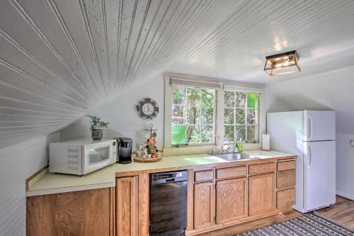a kitchen with a white refrigerator and a microwave at Owls Nest Studio with Hot Tub Hike Nearby! in Ashford