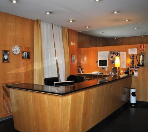 a large reception desk in a hospital room at Hotel España in Guadalajara