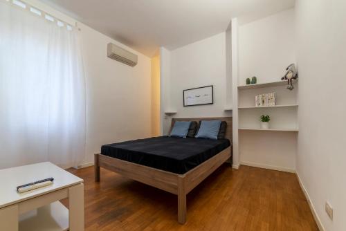 Postel nebo postele na pokoji v ubytování Testaccio & Piazza Liberatrice Apartment