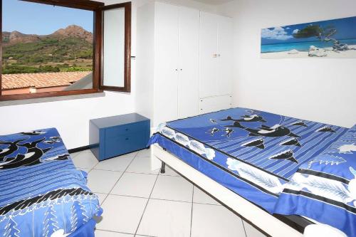Posteľ alebo postele v izbe v ubytovaní Appartamenti Residence il Porto 13 e 16