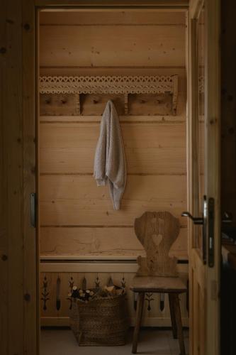 a sauna with a towel hanging on the wall at Domek Pod Lipkami in Zakopane