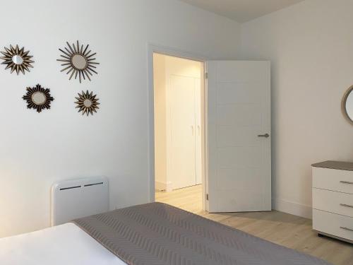Ένα ή περισσότερα κρεβάτια σε δωμάτιο στο Fleets Height Apartment Ten