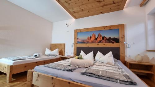 Una cama o camas en una habitación de Apartment Himmelreichhof