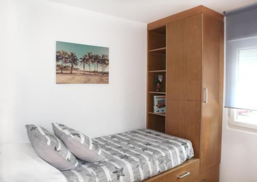 Postel nebo postele na pokoji v ubytování Apartamento Los Canarios